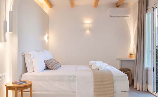 The bedroom of the deluxe suite
